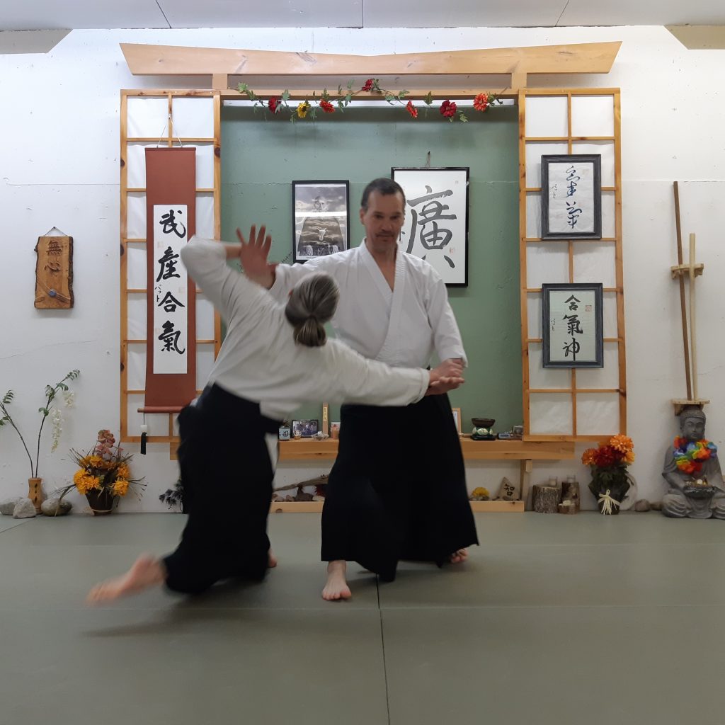 Doug Sensei, in front of the Shomen, throwing Leanne Sensei with Tenchinage